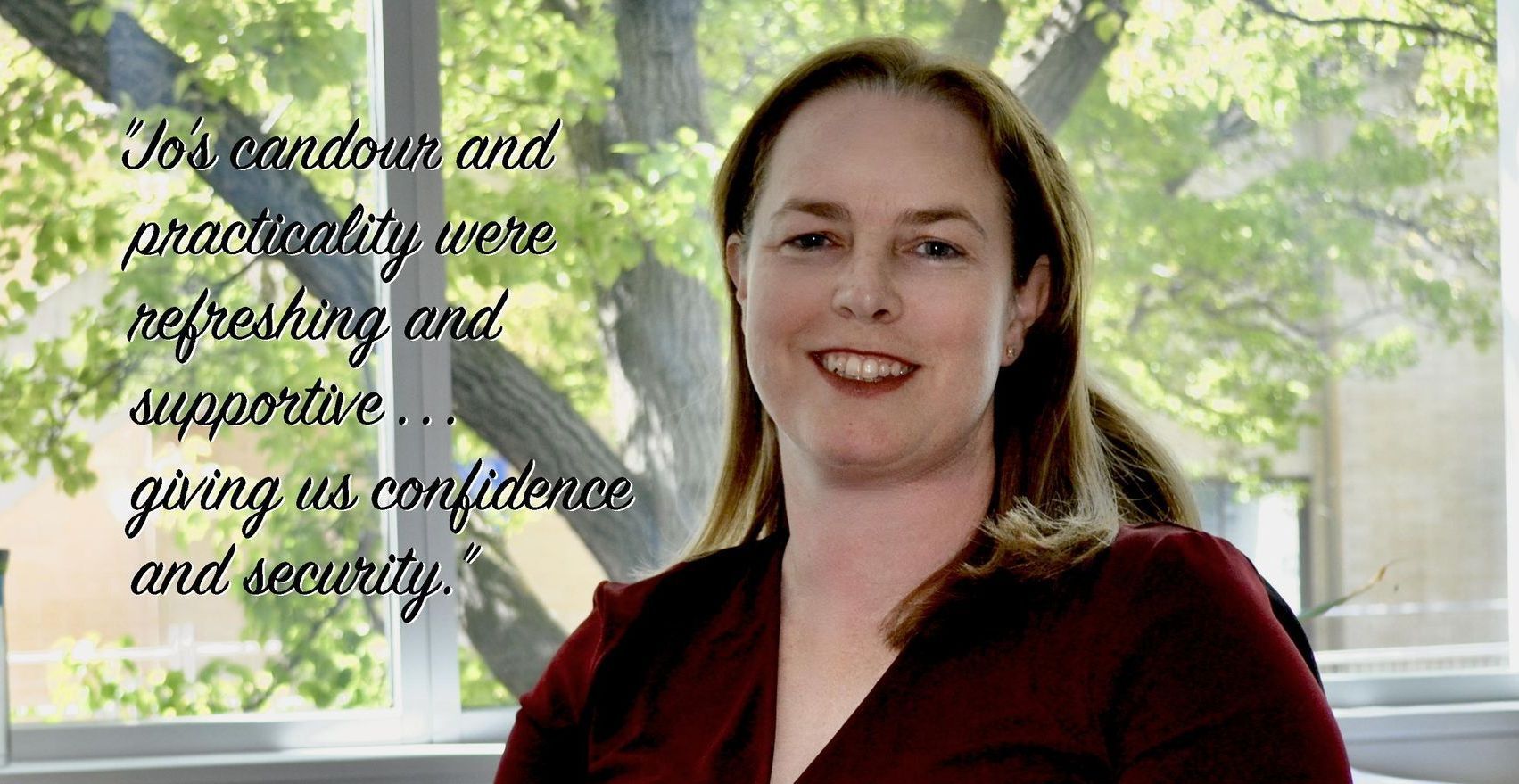 Woman smiling, quote praising her 