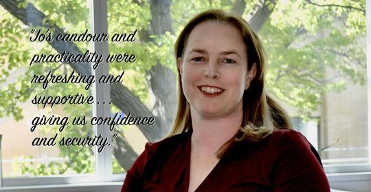 Woman smiling, quote praising her 