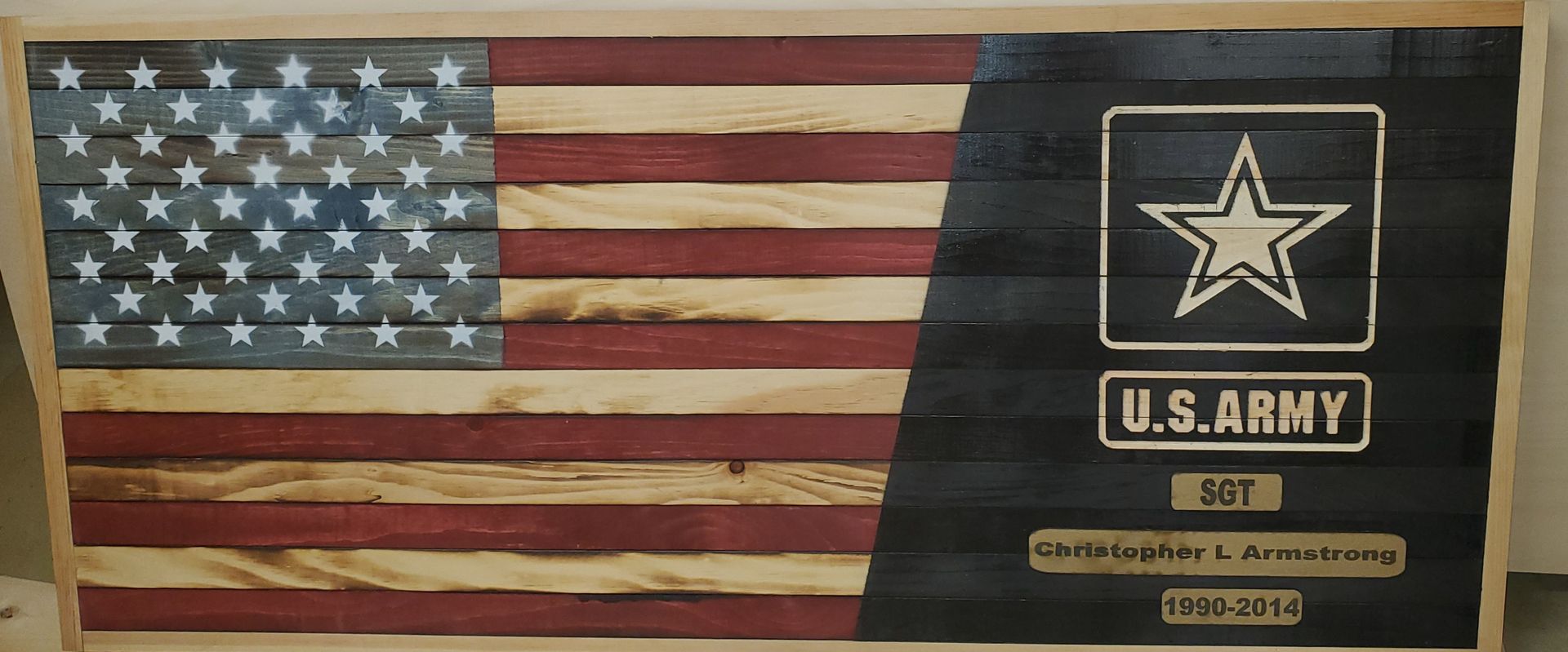 American flag mural with U.S. Army emblem and text on the right