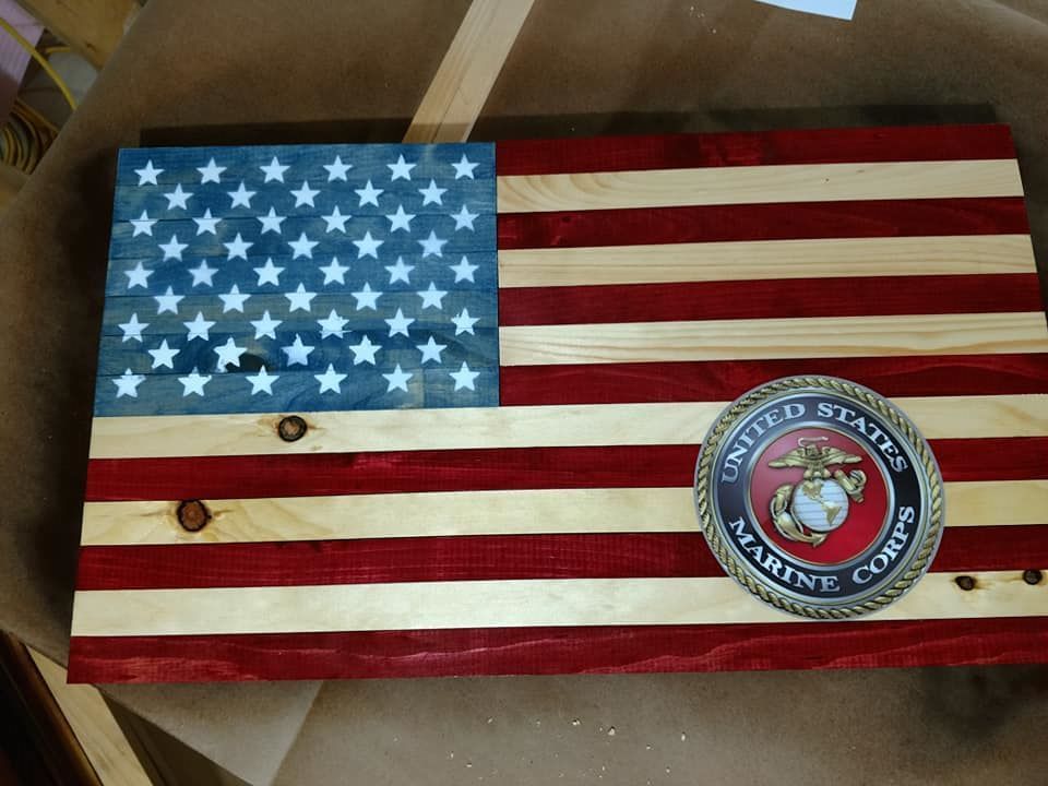 Wooden American flag plaque with a Marine Corps emblem on the lower right.