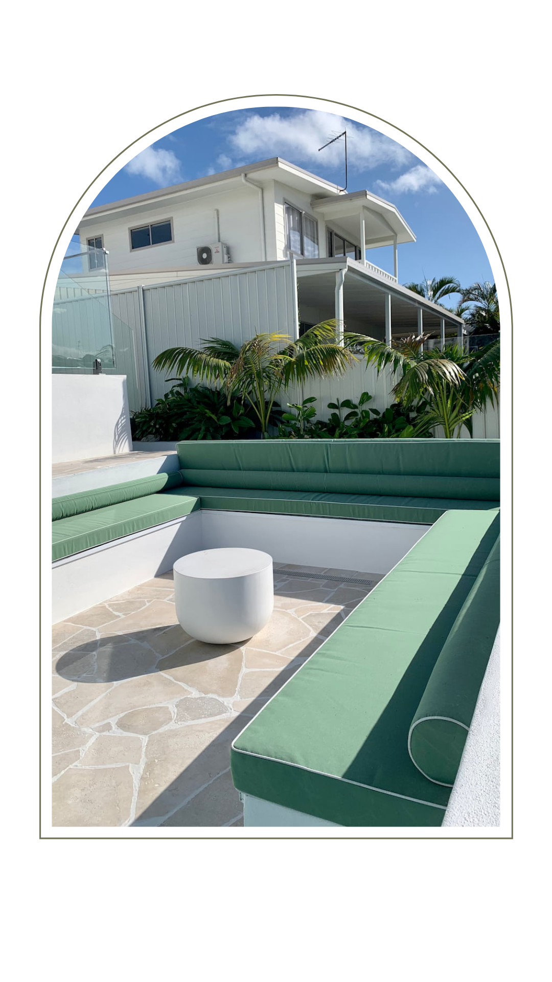 Outdoor seating area next to a pool - Pool Landscaping Gold Coast