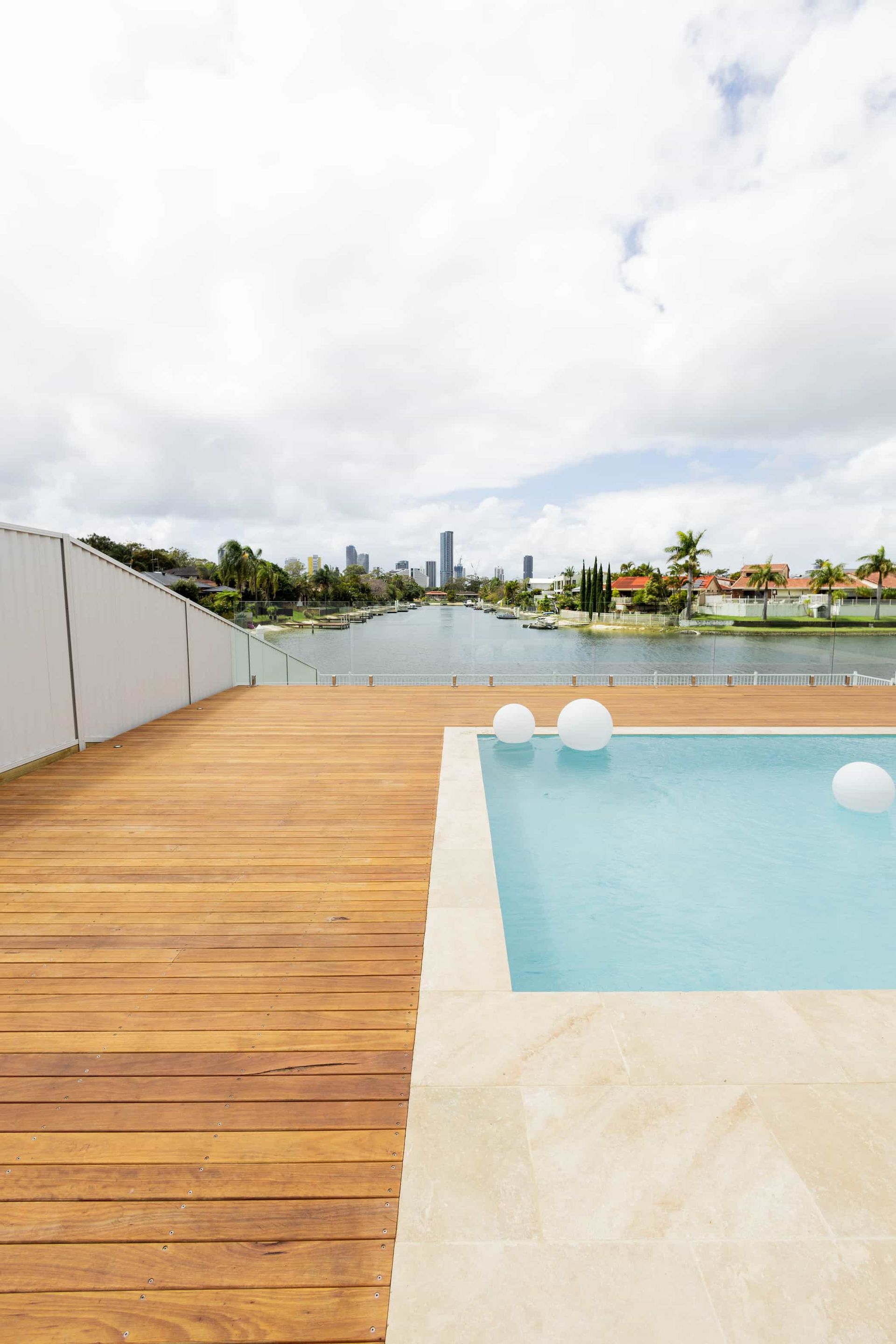 Deck wrapping around a pool - Decking Gold Coast
