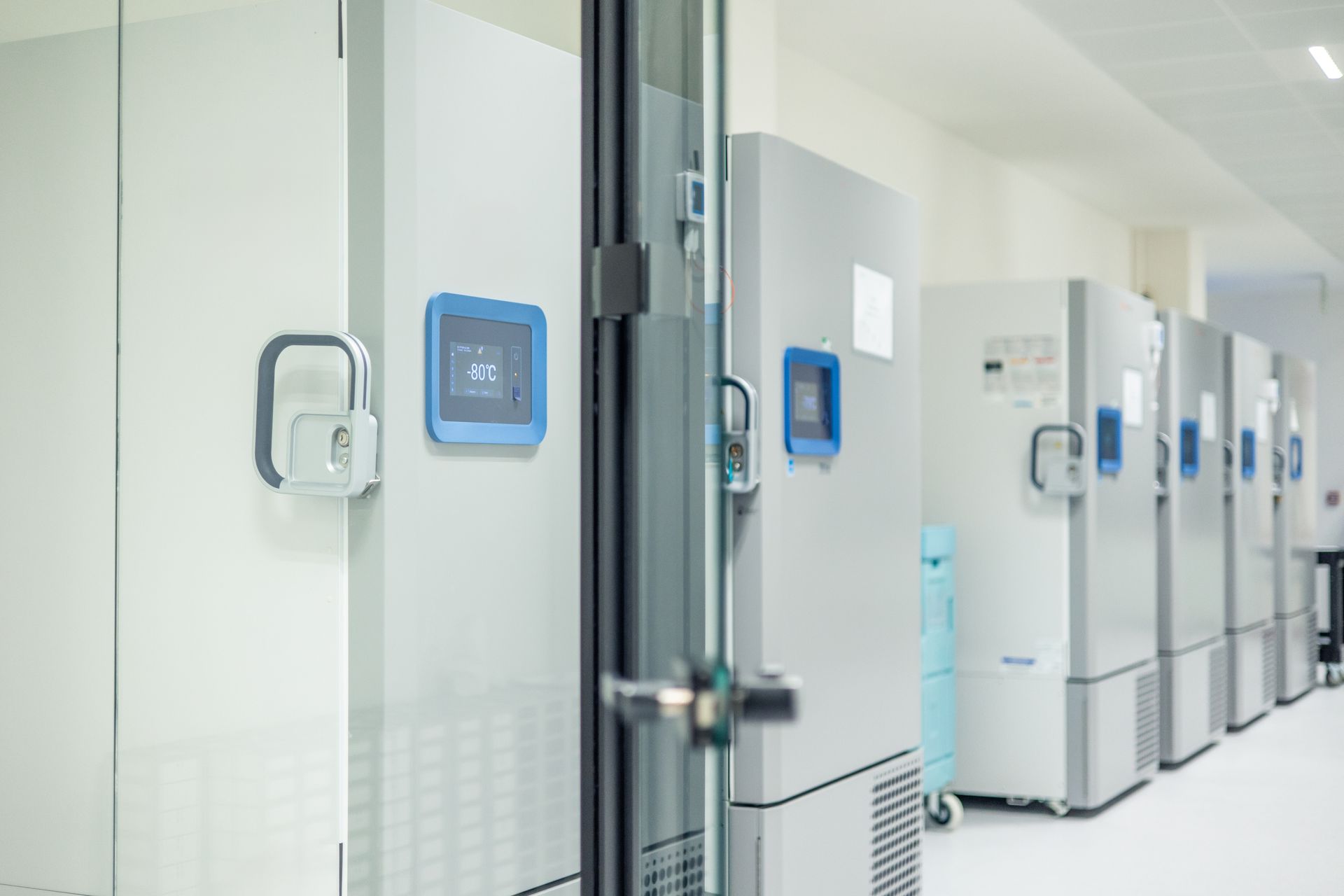 Laboratory deep freezer storing biological samples at minus eighty degrees celsius.