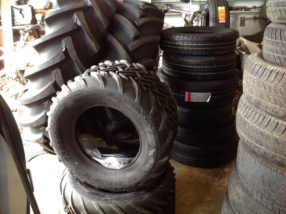 A Bunch of Tires Are Stacked on Top of Each Other — Modern Motors-Nabiac in Nabiac, NSW