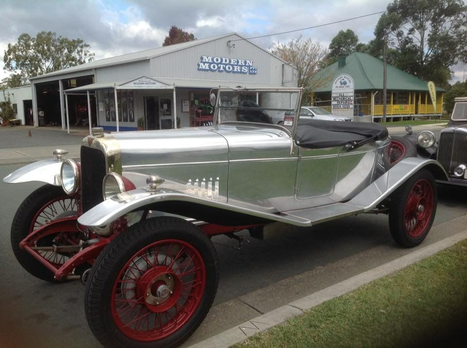 A Silver Car Is Parked in Front of A Modern Motors Building — Modern Motors-Nabiac in Nabiac, NSW