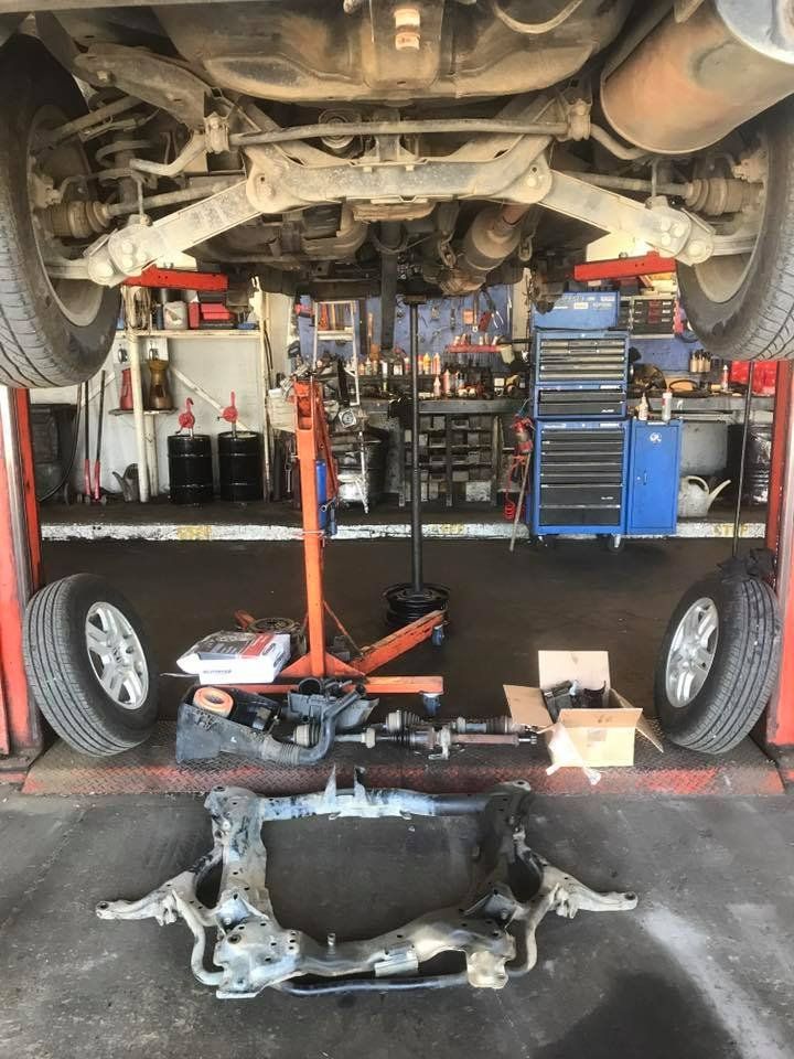 The Underside of A Car Is Being Worked on In a Garage — Modern Motors-Nabiac in Nabiac, NSW