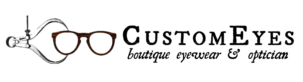 the logo for custom eyes boutique eyewear and optician