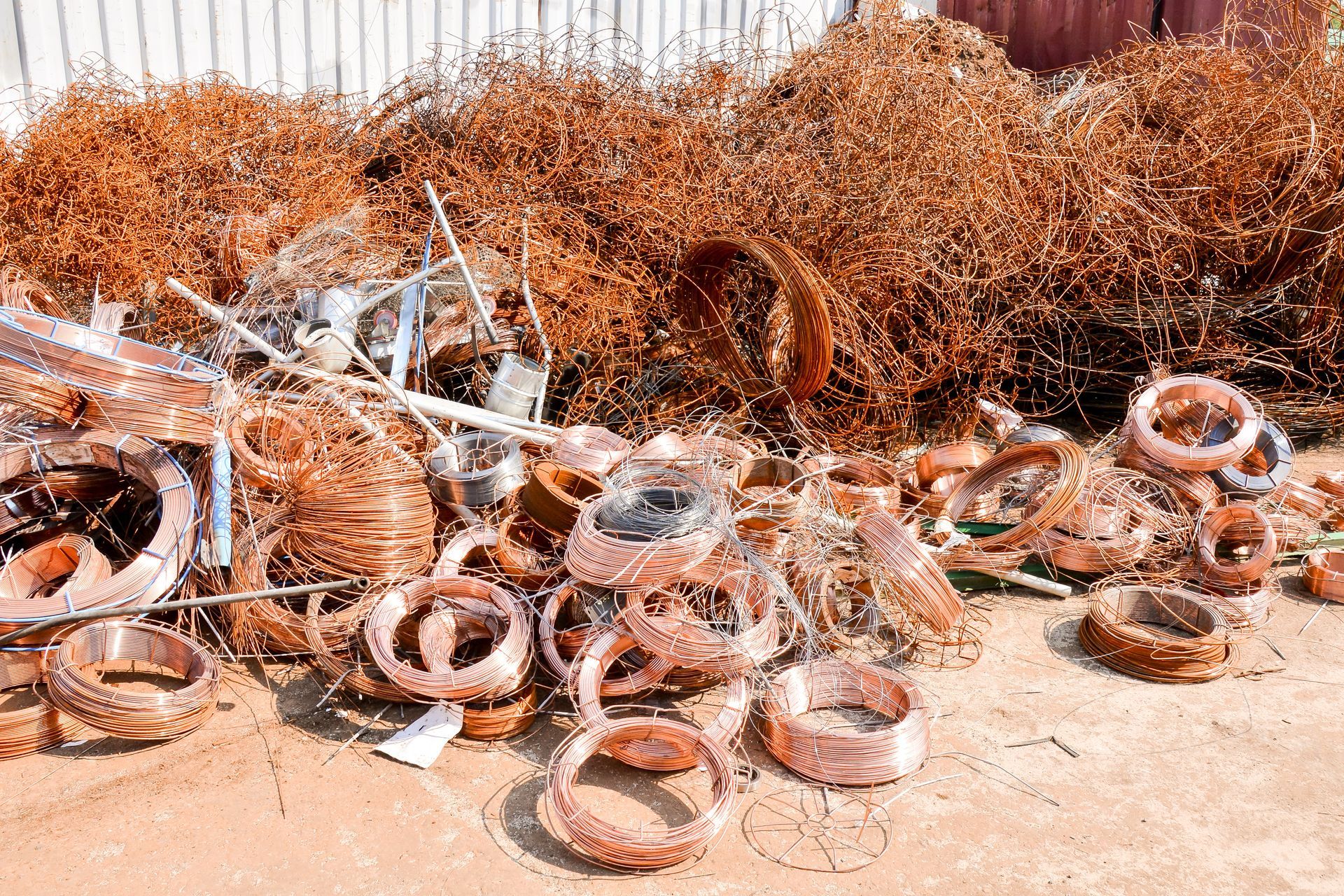 Scrap copper wire and pipe sorted for copper recycling at a licensed facility.