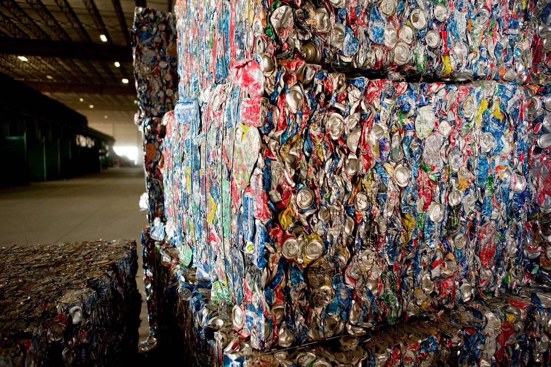 Compressed aluminum can for recycling.