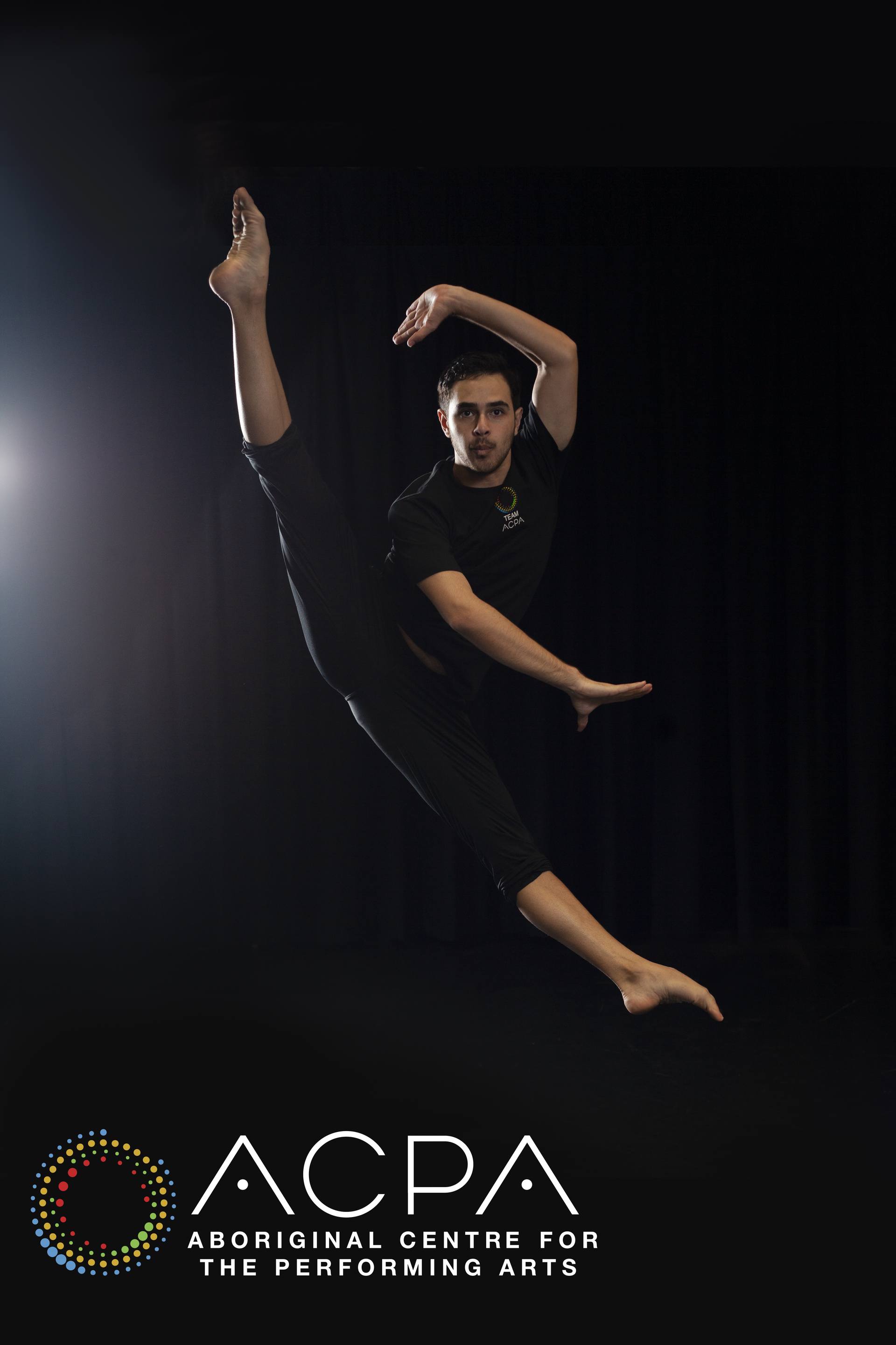 Aboriginal Centre of the Performing Arts - Contemporary dancer in black, balancing with one leg raised against a dark stage backdrop; ACPA logo below.