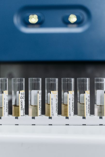 Collecting a well water sample from a kitchen faucet for lab testing