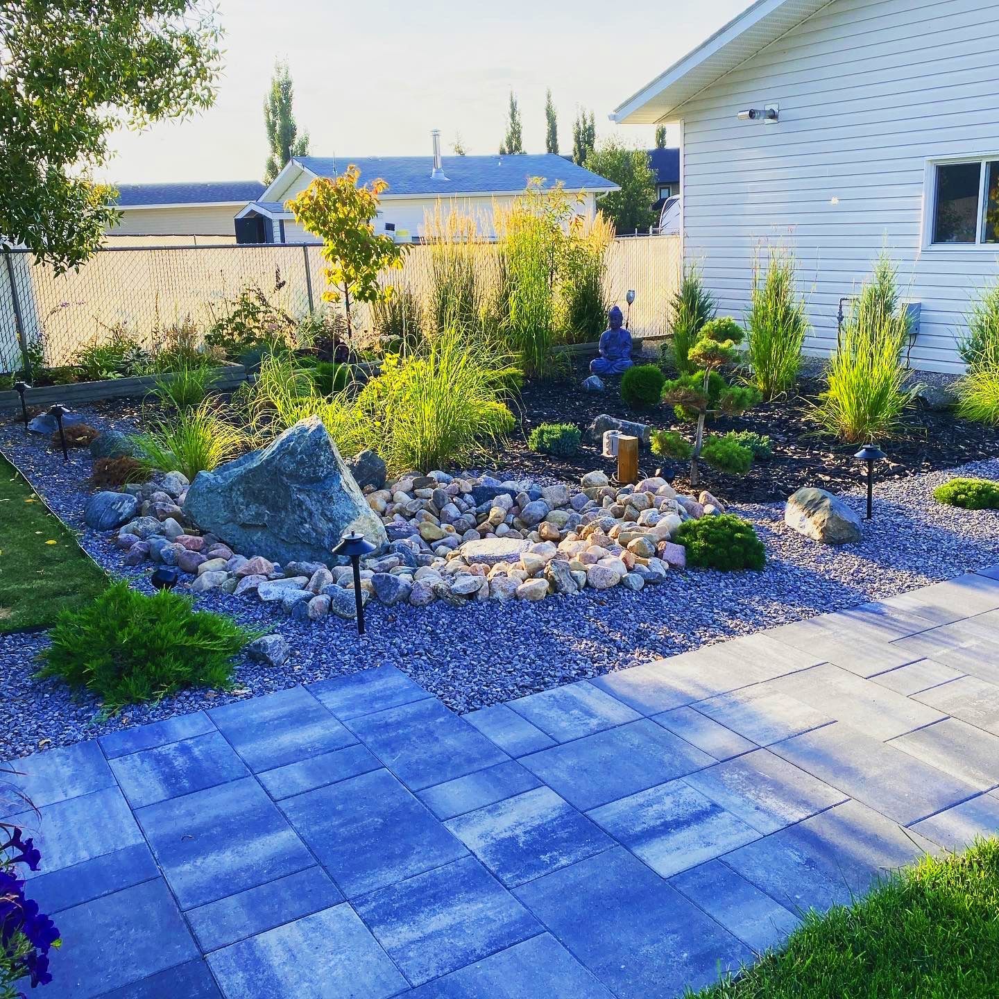 dream backyard with bubbler rock and planting