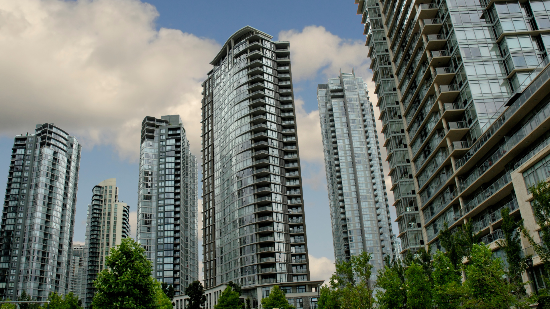A city with a lot of tall buildings and trees