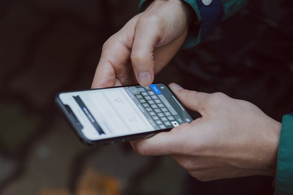 Hand Holding Phone — San Diego, CA — Western Fastener Hand Holding Phone — San Diego, CA — Western Fastener