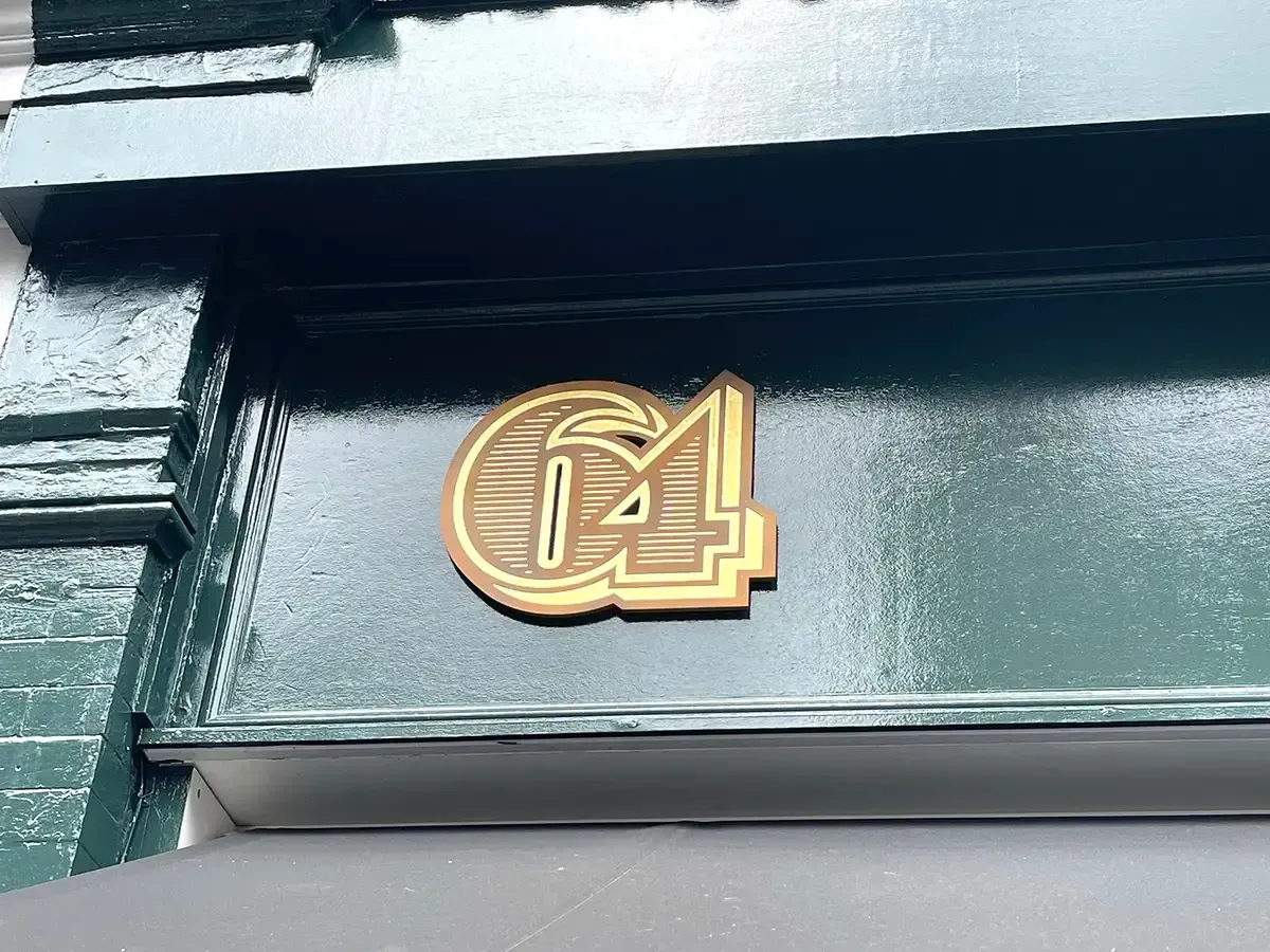 64 Goodge Street external retail signage