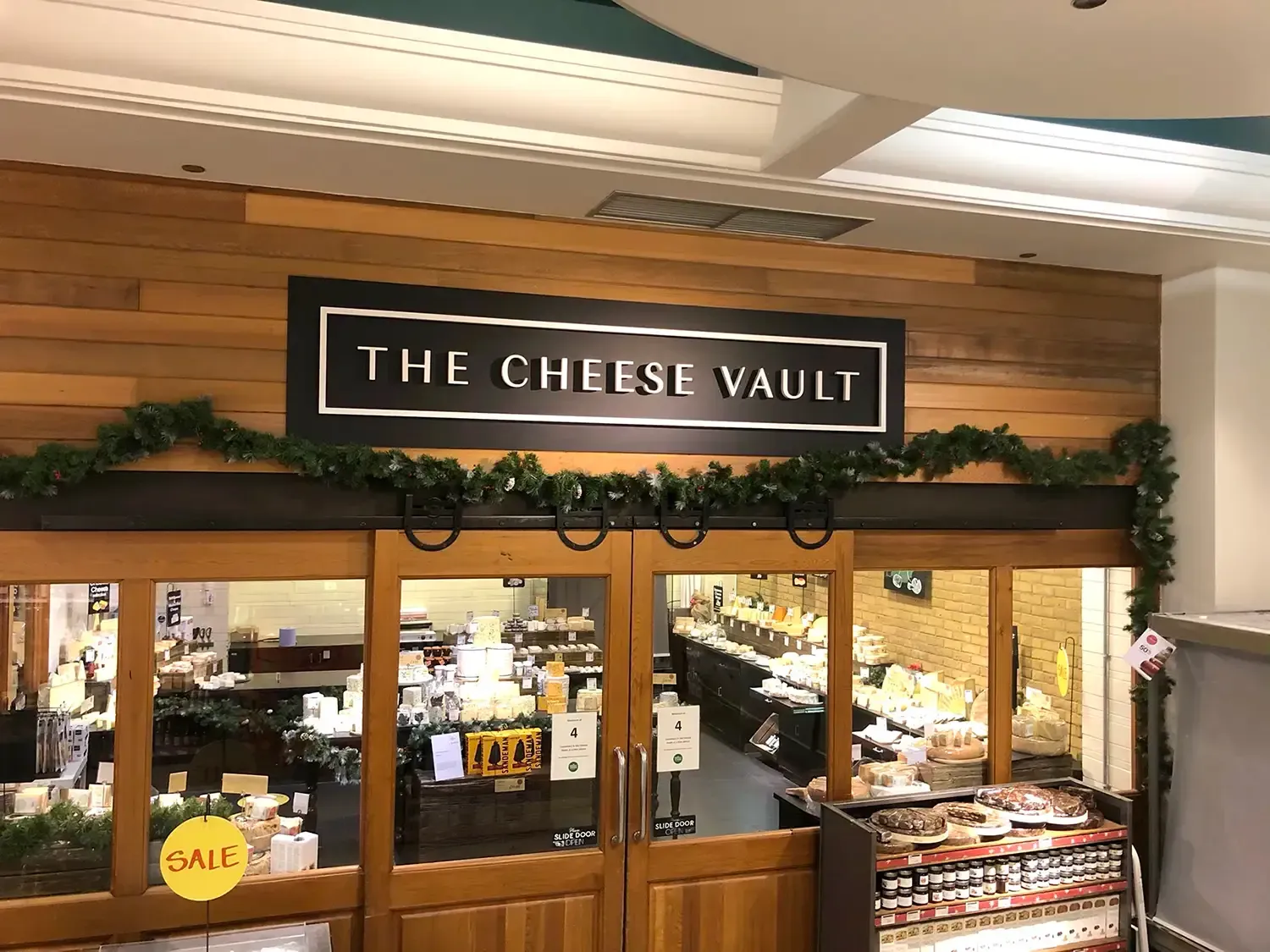 Whole Foods Kensington cheese vault signage