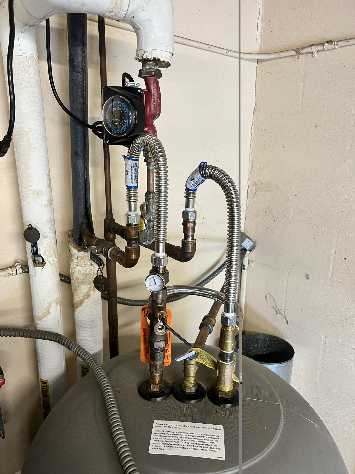 Technician Servicing Heating Boiler — Wimauma, FL — Reedy Plumbing Technician Servicing Heating Boiler — Wimauma, FL — Reedy Plumbing