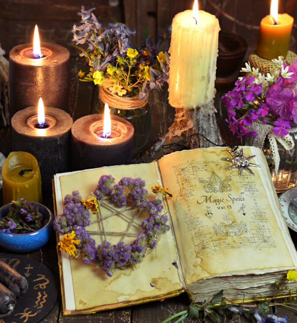 A book is open to a page that says magic spells