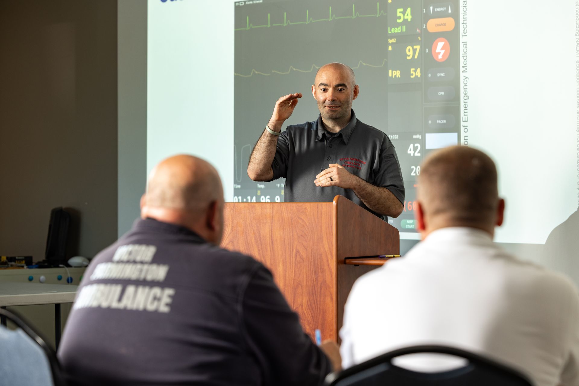 Victor Farmington Ambulance instructor leading a continuing education case study session