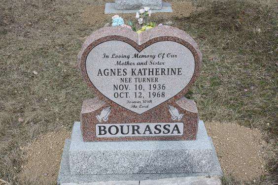Gray granite gravestone for Agnes Katherine BOURASSA in a cemetery, with engraved dates.