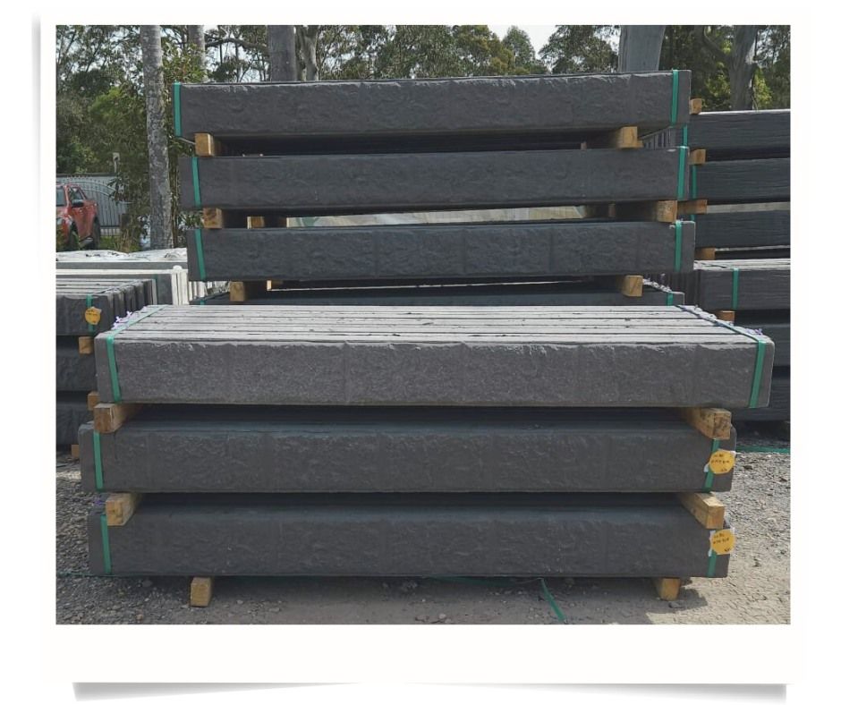 Stacks of Gray Rectangular Concrete Beams on Wooden Pallets — Concrete Sleepers NSW - Port Macquarie in Sancrox, NSW