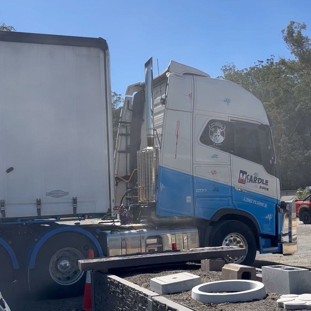 A blue and White Semi-truck Parked Outside — Concrete Sleepers NSW - Port Macquarie in Singleton, NSW