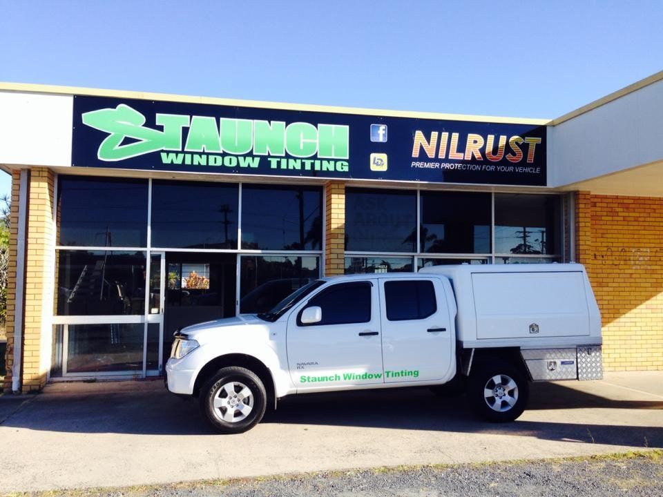 A White Truck Is Parked In Front Of A Window Tinting Shop — Staunch Window Tinting In South Lismore, NSW