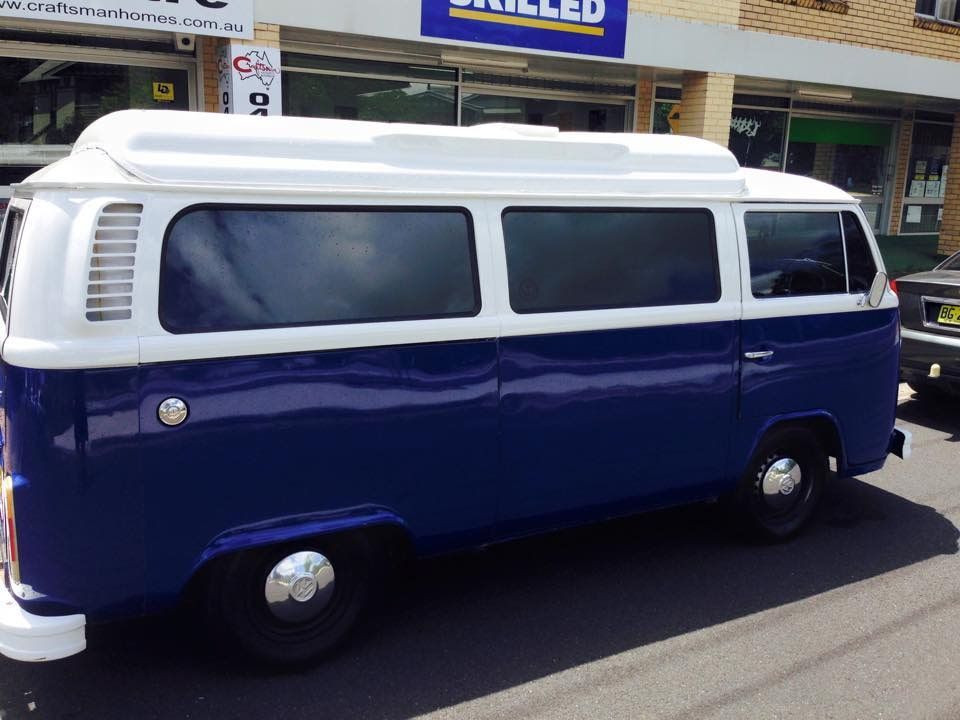 A Blue And White Van With Tint Window — Staunch Window Tinting In South Lismore, NSW