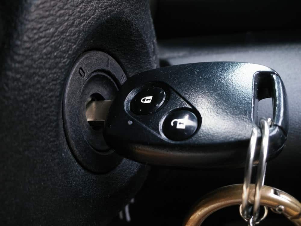 Car Key Inserted Into the Ignition With a Black Key Fob Attached — All Pro Locksmiths In Port Macquarie, NSW