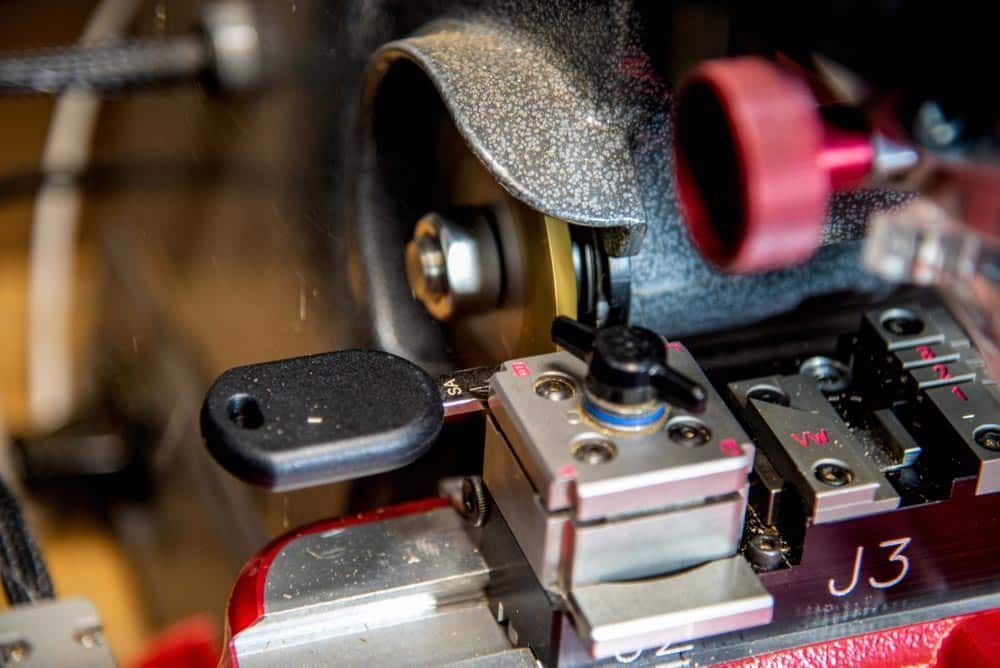 Key Being Cut by a Key-cutting Machine — All Pro Locksmiths In Port Macquarie, NSW