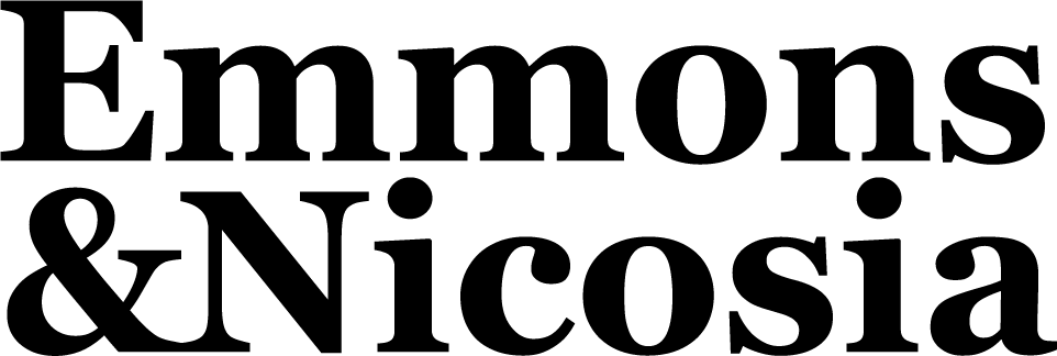 The logo for emmons & nicosia is black and white.