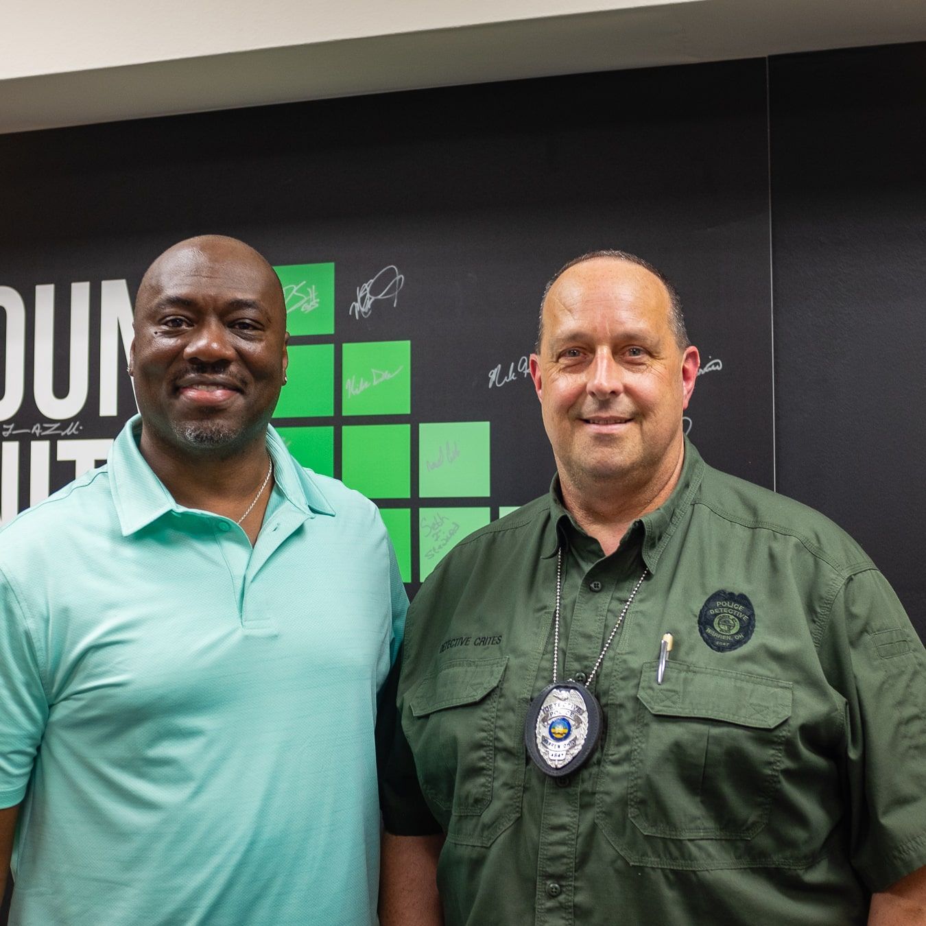 DeShawn Scott and Det. Brian Crites after an interview session for the City of Warren Police + Community Trust Initiative