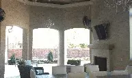 A living room filled with furniture and a fireplace.