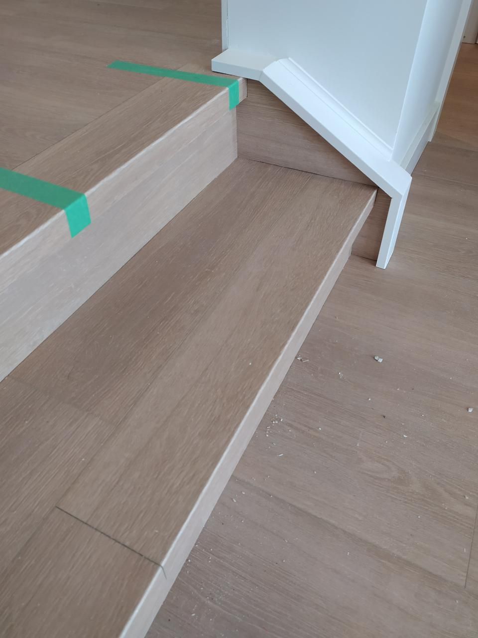 New oak laminate installed in a Sherwood Park home by XMP Construction.