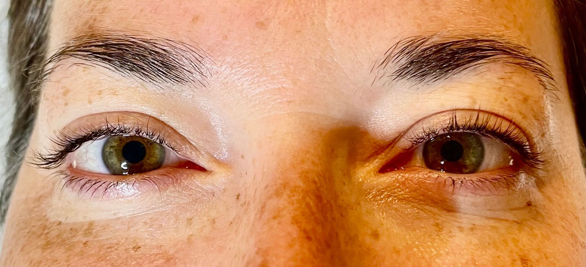 a close up of a person 's eyes before & after lash lift