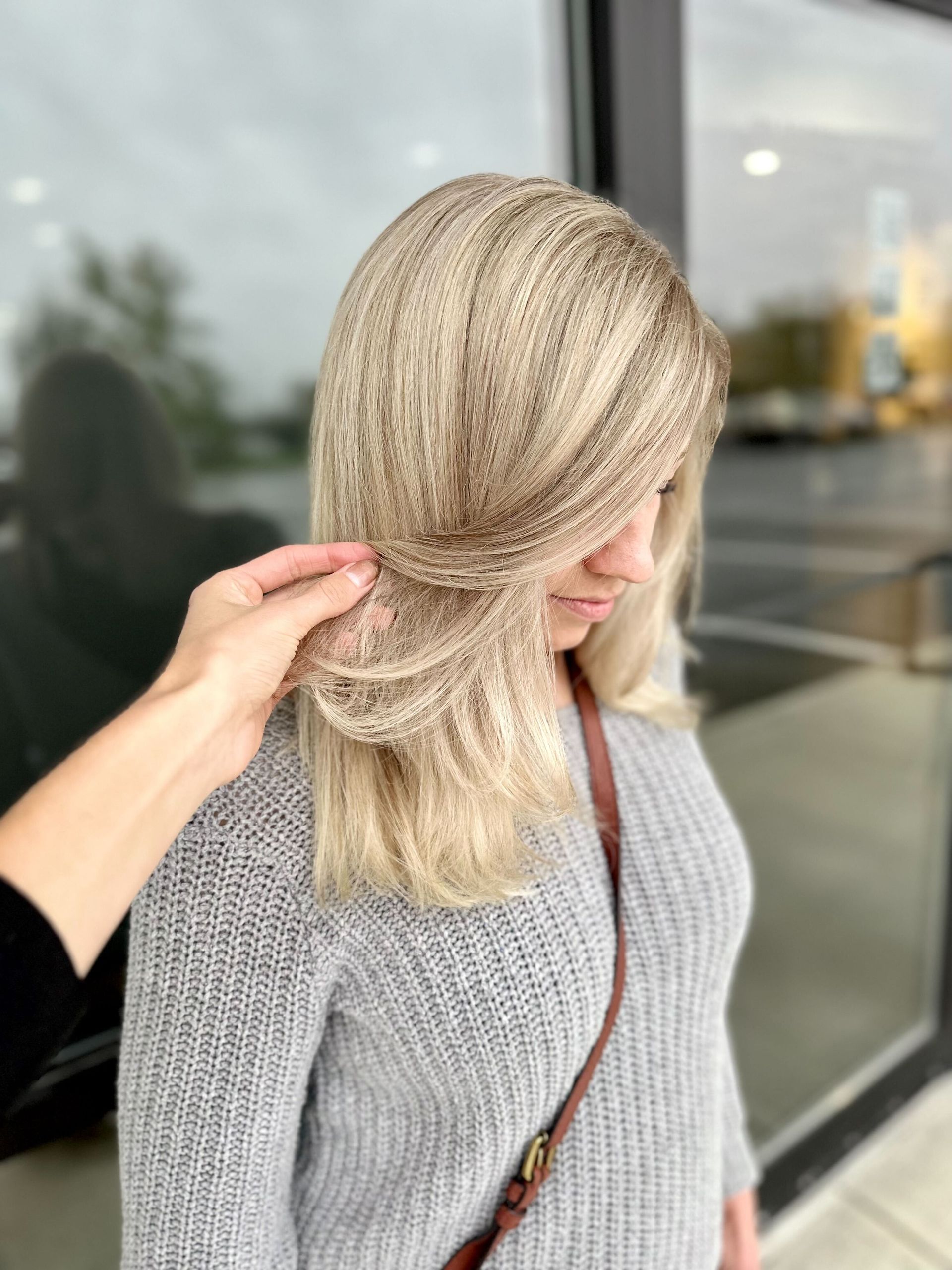 sleek and shiny blond hair style