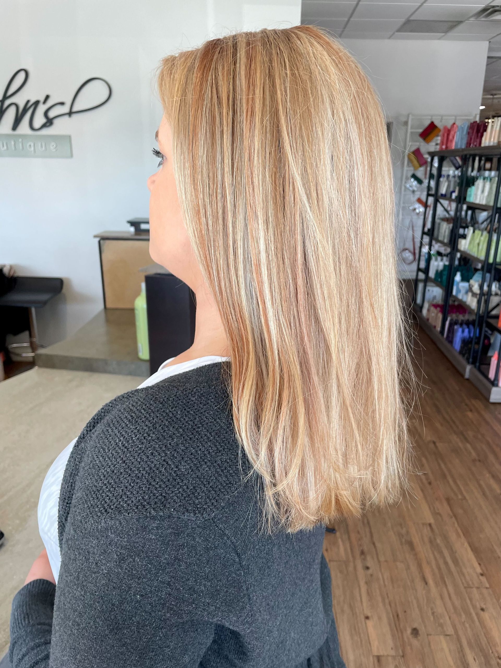 warm blond medium length hair cut and color