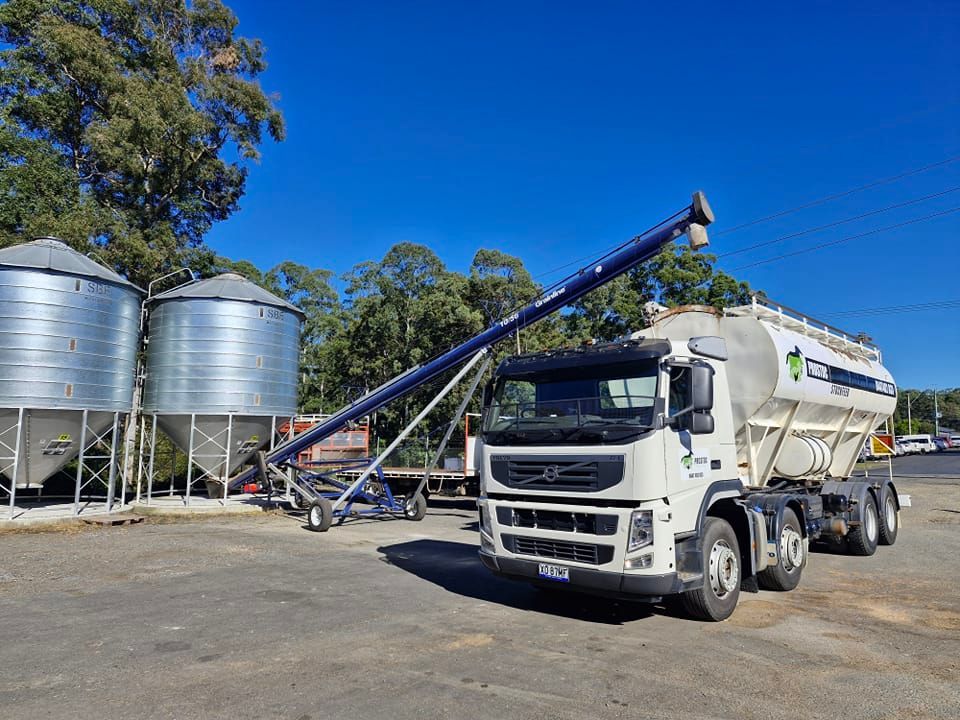 A White Tanker Truck Next to Two Silver Silos — Prostoc In South Kempsey, NSW