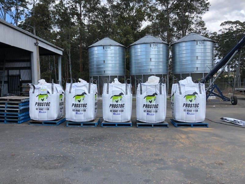 Five Large Bags of Animal Feed on Pallets — Prostoc In Gladstone, NSW