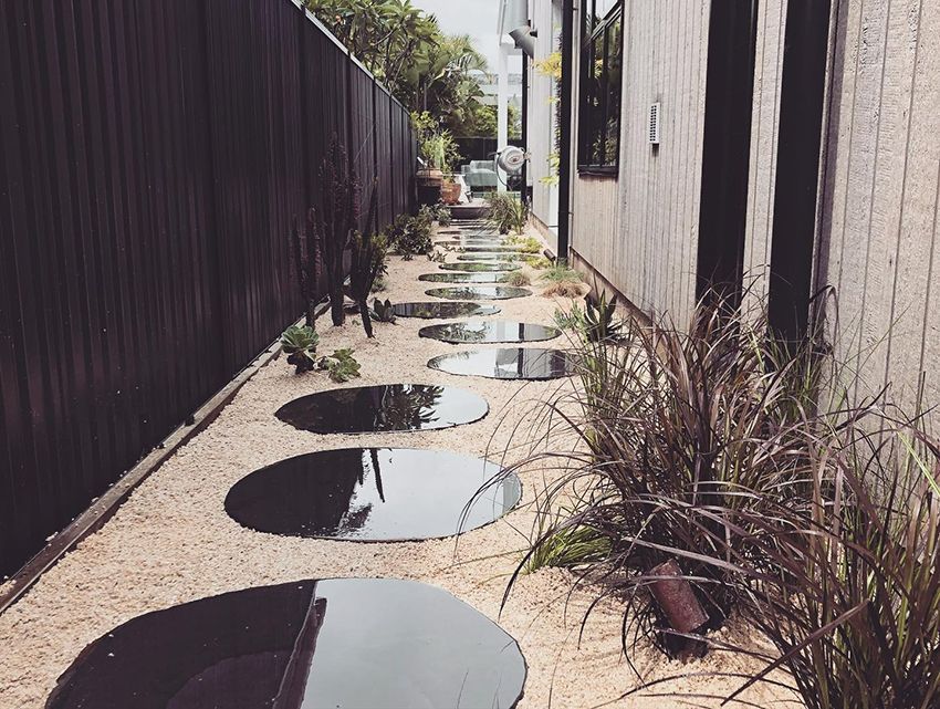A Walkway Leading to a House with a Fence and Stepping Stones — HMJ Landscapes in Burleigh Heads, QLD