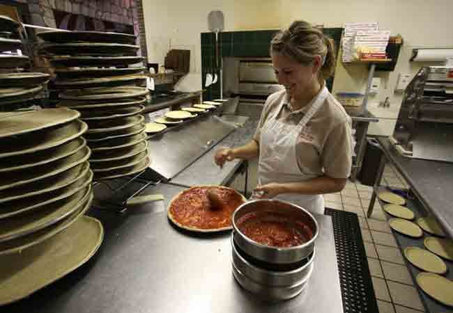 chef making pizzas chef making pizzas