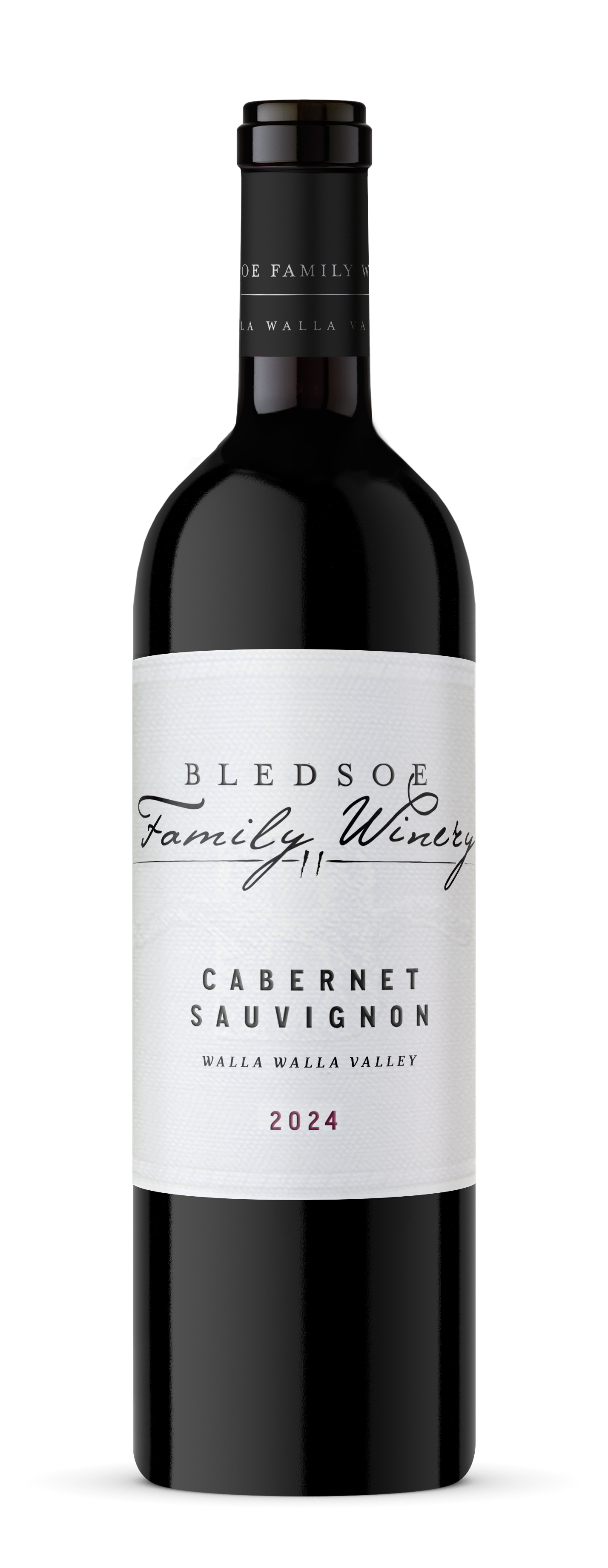 Black wine bottle with white label, standing on a plain white background.
