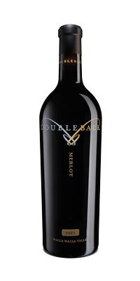 Black wine bottle with gold label and detailing on a white background