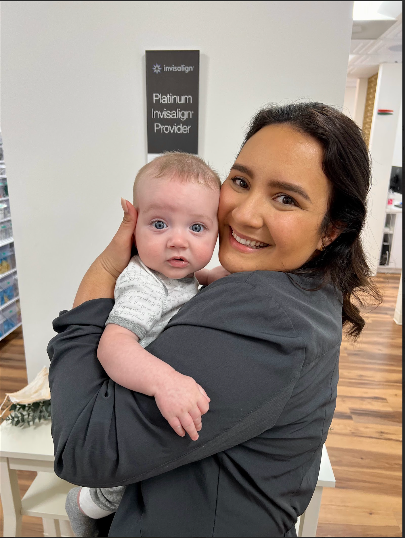 Dr. Vallo assistant with baby