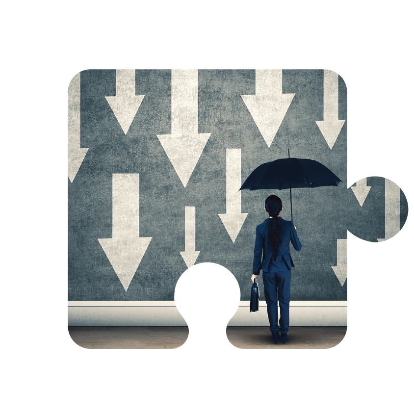 A person holding an umbrella stands before a wall of white downward arrows inside a puzzle piece frame
