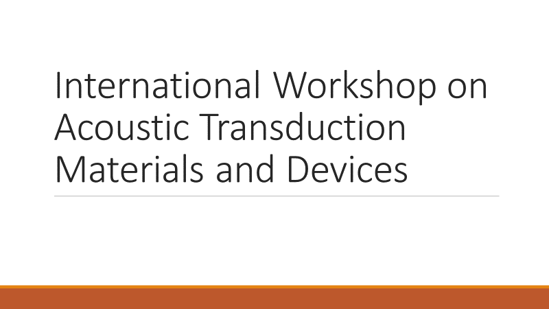 A white background with the words `` international workshop on acoustic transduction materials and devices '' written on it.