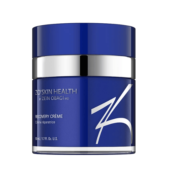 A navy blue jar of ZO Skin Health Recovery Crème with a silver band and the white ZO logo on the front.
