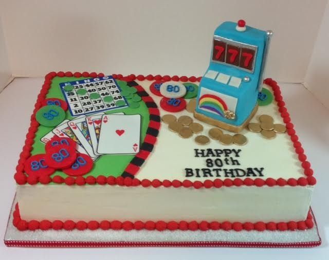 Birthday cake decorated like a slot machine and cards, with “Happy 80th Birthday” on top.