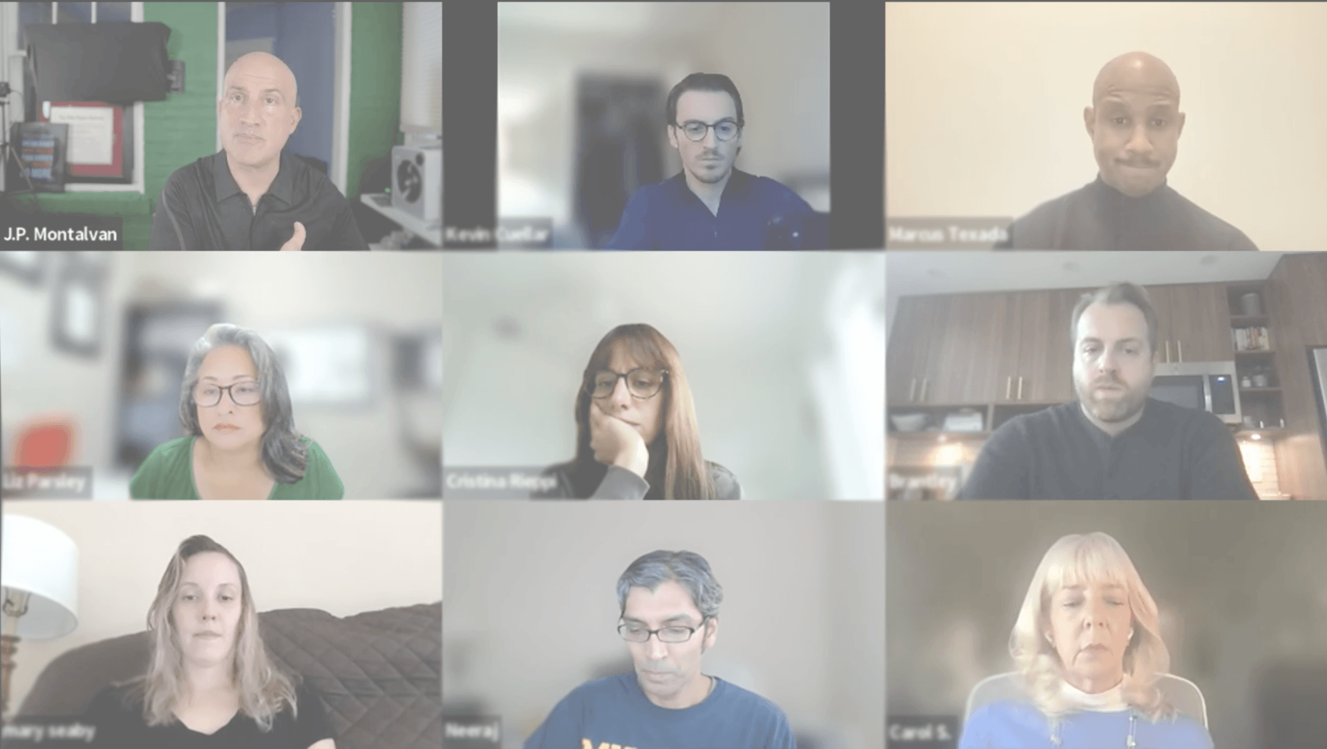 Nine people in a video conference call, possibly a meeting, visible from the chest up.