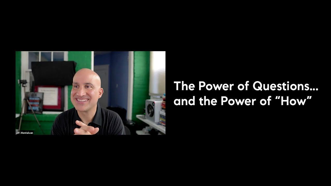 Bald man smiles, gesturing with hands; text: